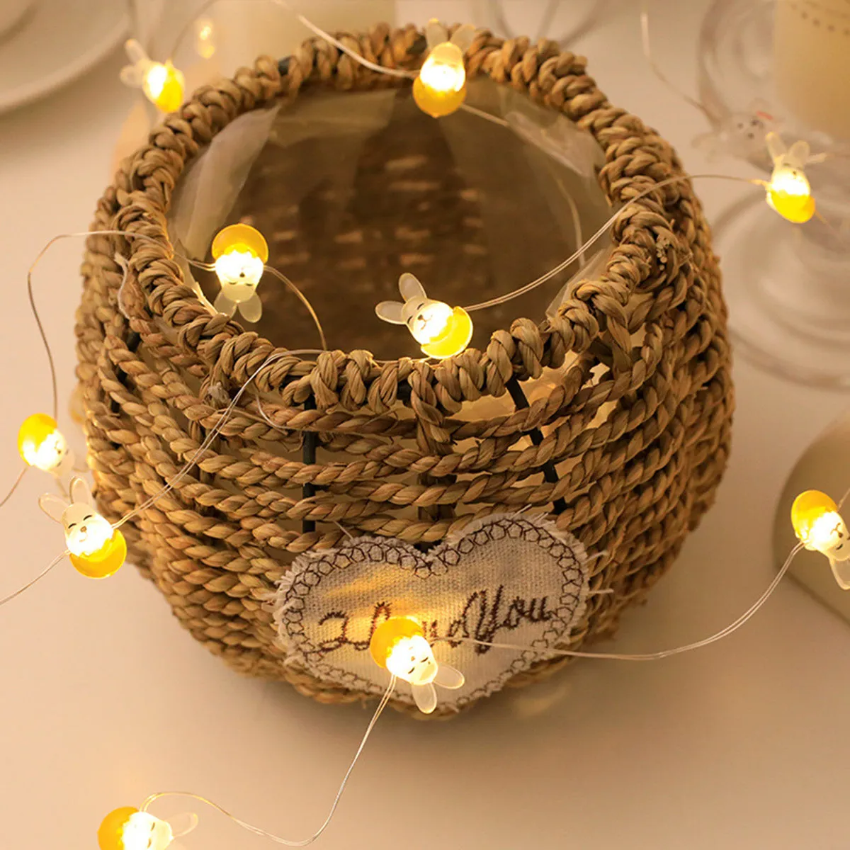 Easter LED bunny string lights with carrot and transparent white rabbit bulbs on a dark background
