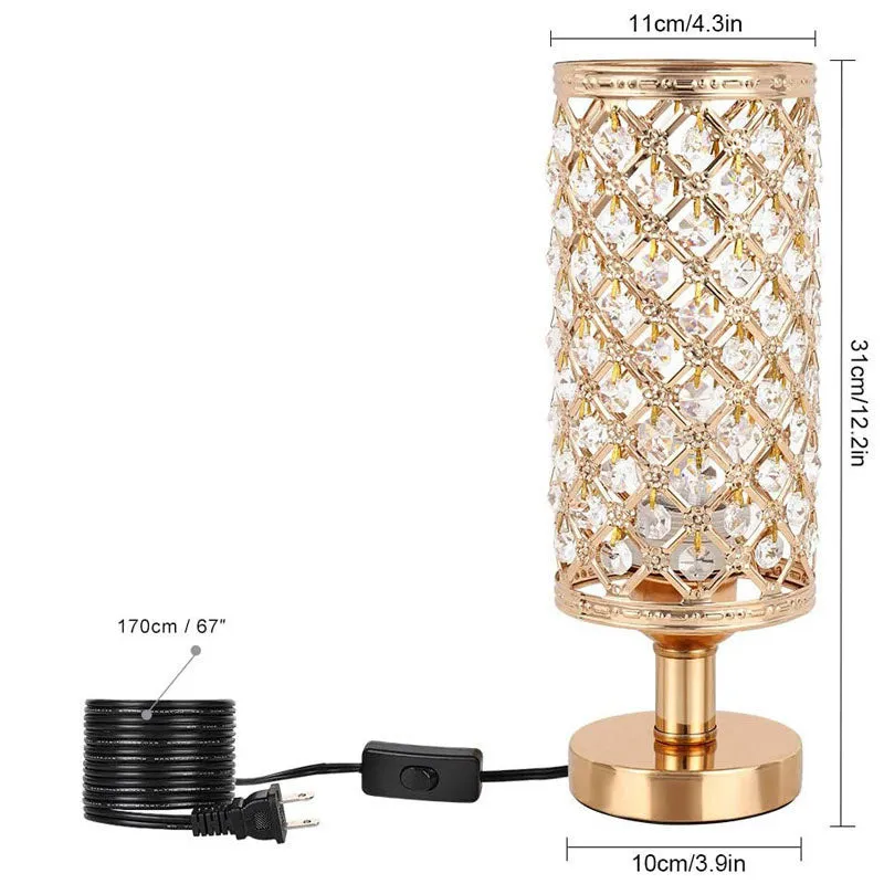 Modern crystal table lamp with hollow-carved design, metal base, gold finish, push button switch, on bedside table