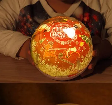 Galaxy projector lamp with diamond-shaped shell showing earth pattern on a table