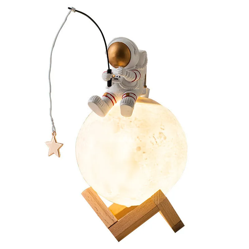 Gold resin astronaut figurine with wooden base, USB cold fog humidifier and night light, 28cm tall