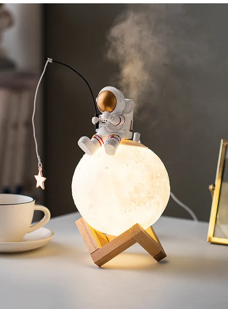 Gold resin astronaut figurine with wooden base, USB cold fog humidifier and night light, 28cm tall