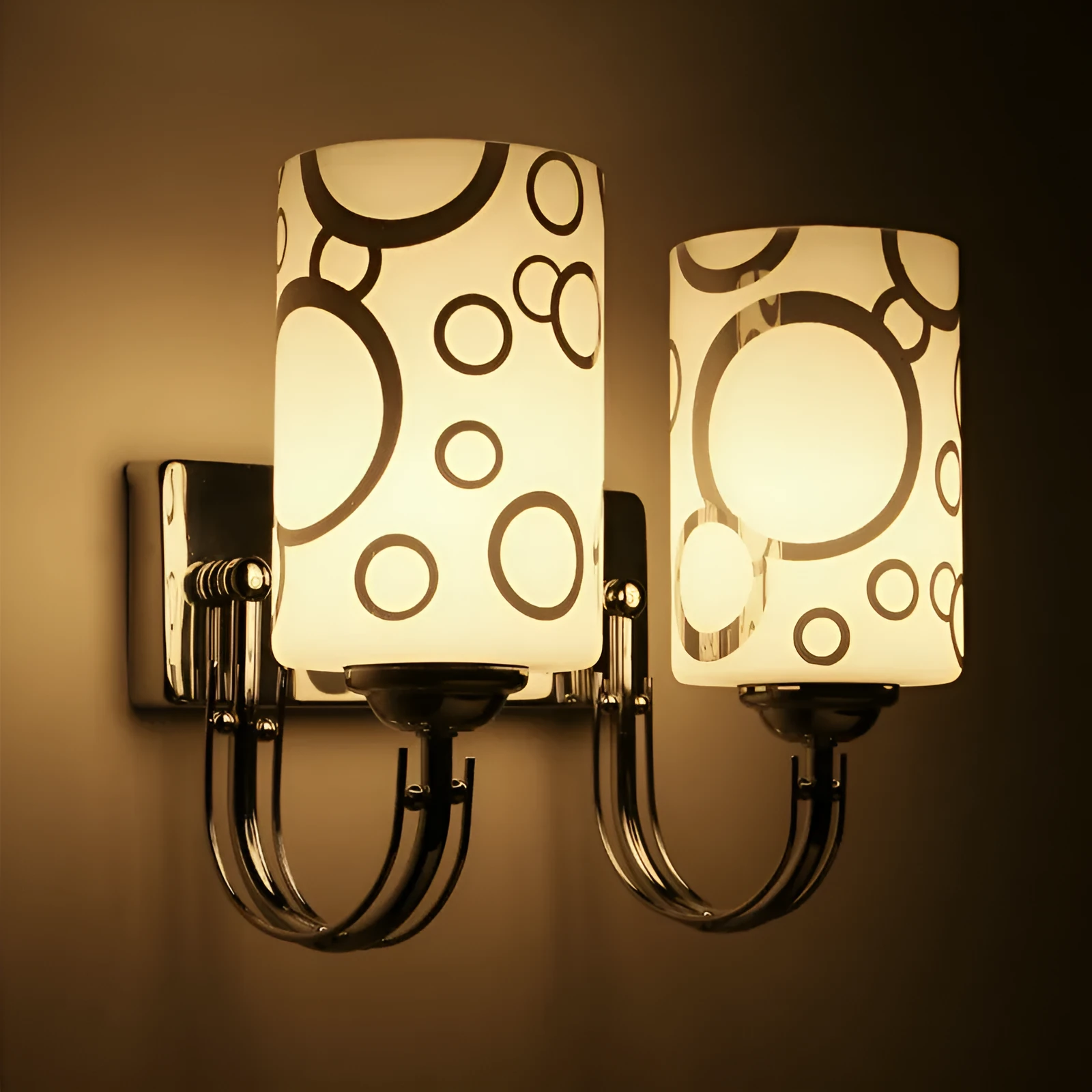 Modern petal designer wall light with acrylic shade and E27 socket, single head version, white finish on a wall