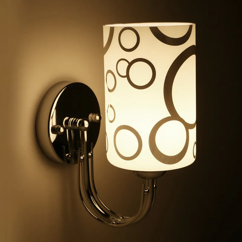 Modern petal designer wall light with acrylic shade and E27 socket, single head version, white finish on a wall