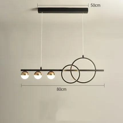 Modern rectangular aluminium ceiling light in black or gold with remote control on a white background.