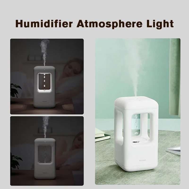 White anti-gravity water drop humidifier with ambient light on bedside table