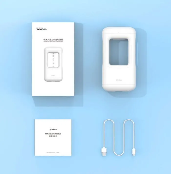 White anti-gravity water drop humidifier with ambient light on bedside table