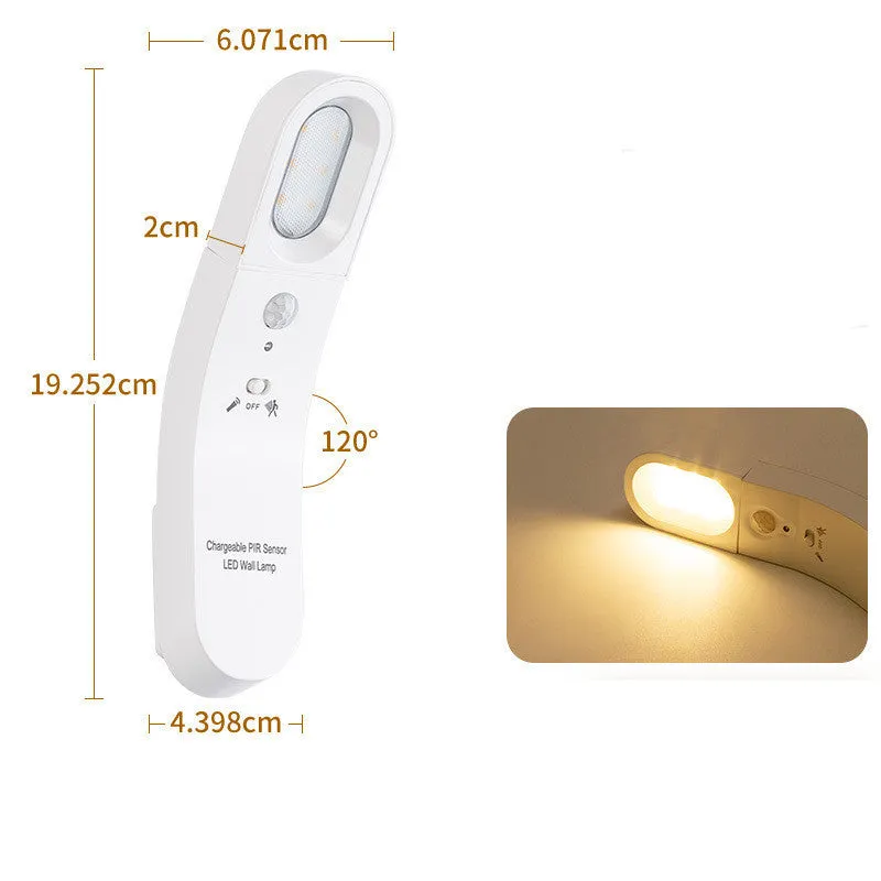 USB human body induction night light with light control, black colour, warm style LED lamp on bedside table