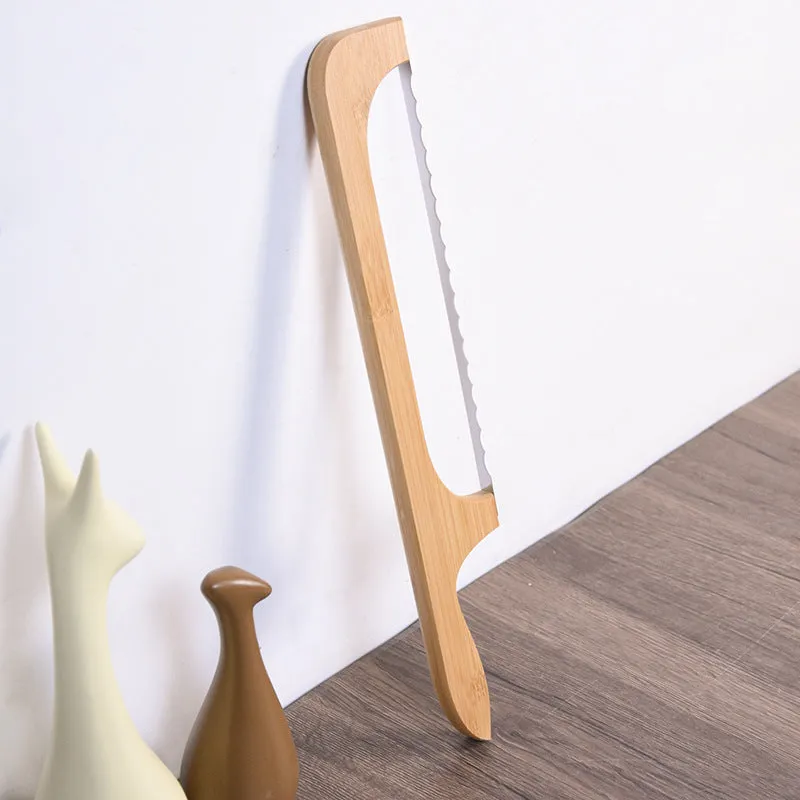 Wooden serrated bread knife 40cm with bending-resistant blade, wooden handle, shown slicing a wholemeal loaf