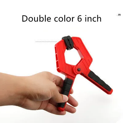 Tool steel woodworking clamp in double colour finish, 7 inch size, on a workbench