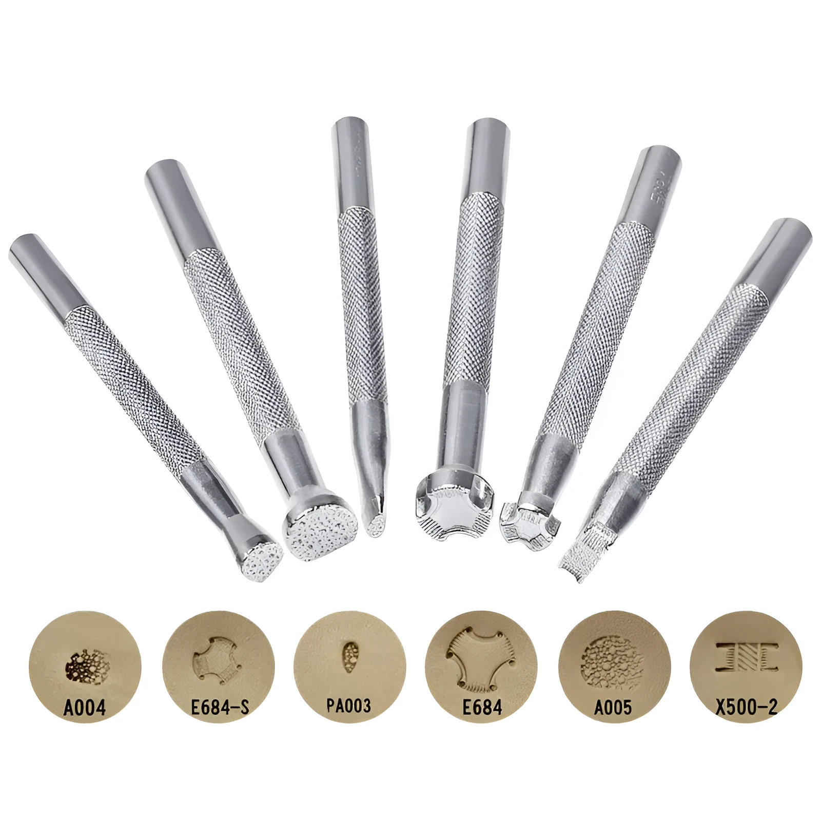 Set of six alloy leather carving printing sticks arranged on a workbench, tools for stamping and embossing