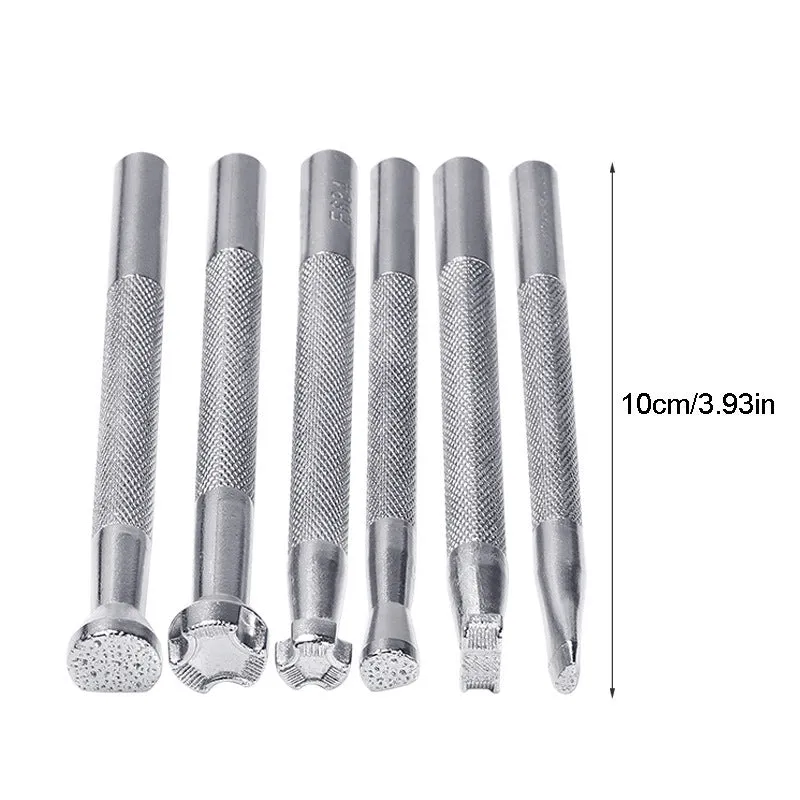 Set of six alloy leather carving printing sticks arranged on a workbench, tools for stamping and embossing