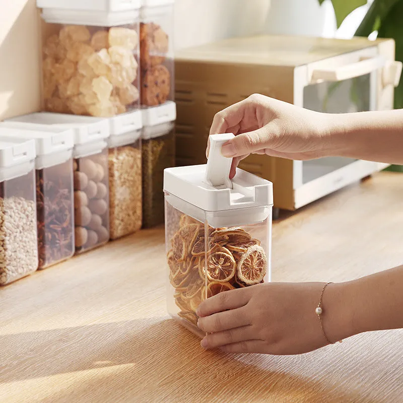 White and transparent Japanese-style plastic storage container for dry foods, 400ml capacity.