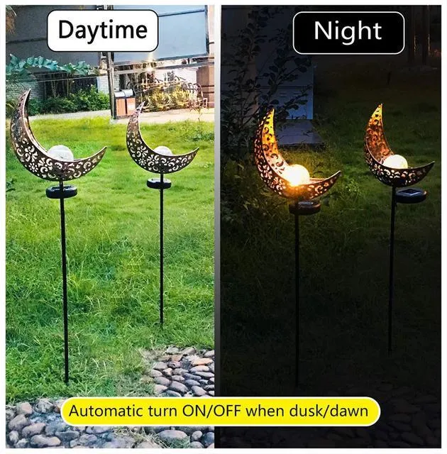LED solar flame light with warm white glow in a garden, featuring iron and glass construction and stake stand