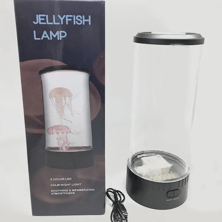 Black jellyfish LED light with acrylic shade on a desk, 35cm tall, USB powered