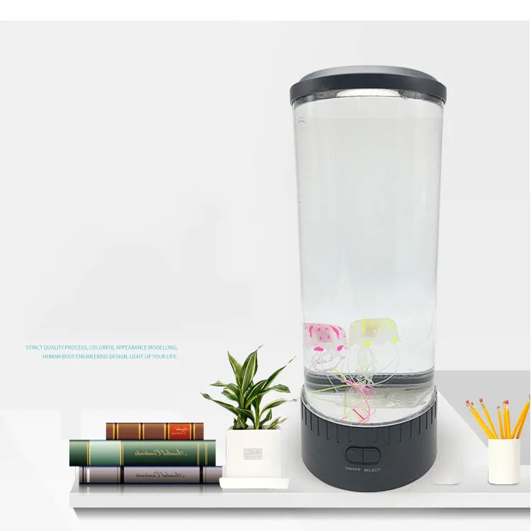 Black jellyfish LED light with acrylic shade on a desk, 35cm tall, USB powered