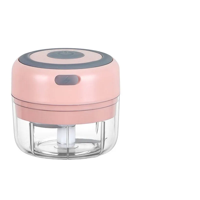 Mini electric garlic chopper with stainless steel blade and USB charging cable in green colour