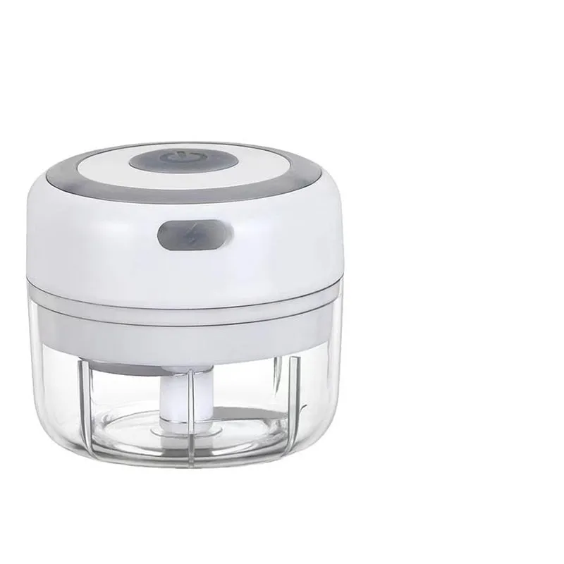 Mini electric garlic chopper with stainless steel blade and USB charging cable in green colour