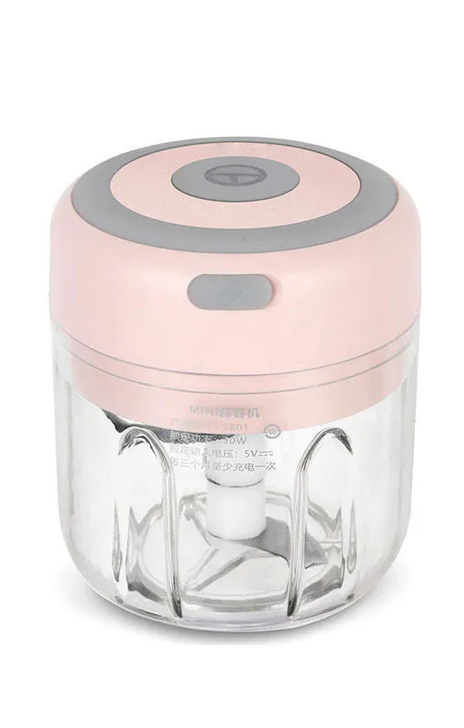 Mini electric garlic chopper with stainless steel blade and USB charging cable in green colour
