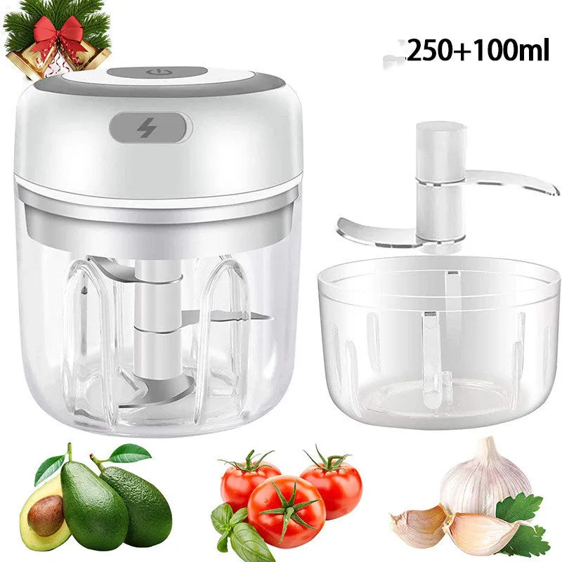 Mini electric garlic chopper with stainless steel blade and USB charging cable in green colour