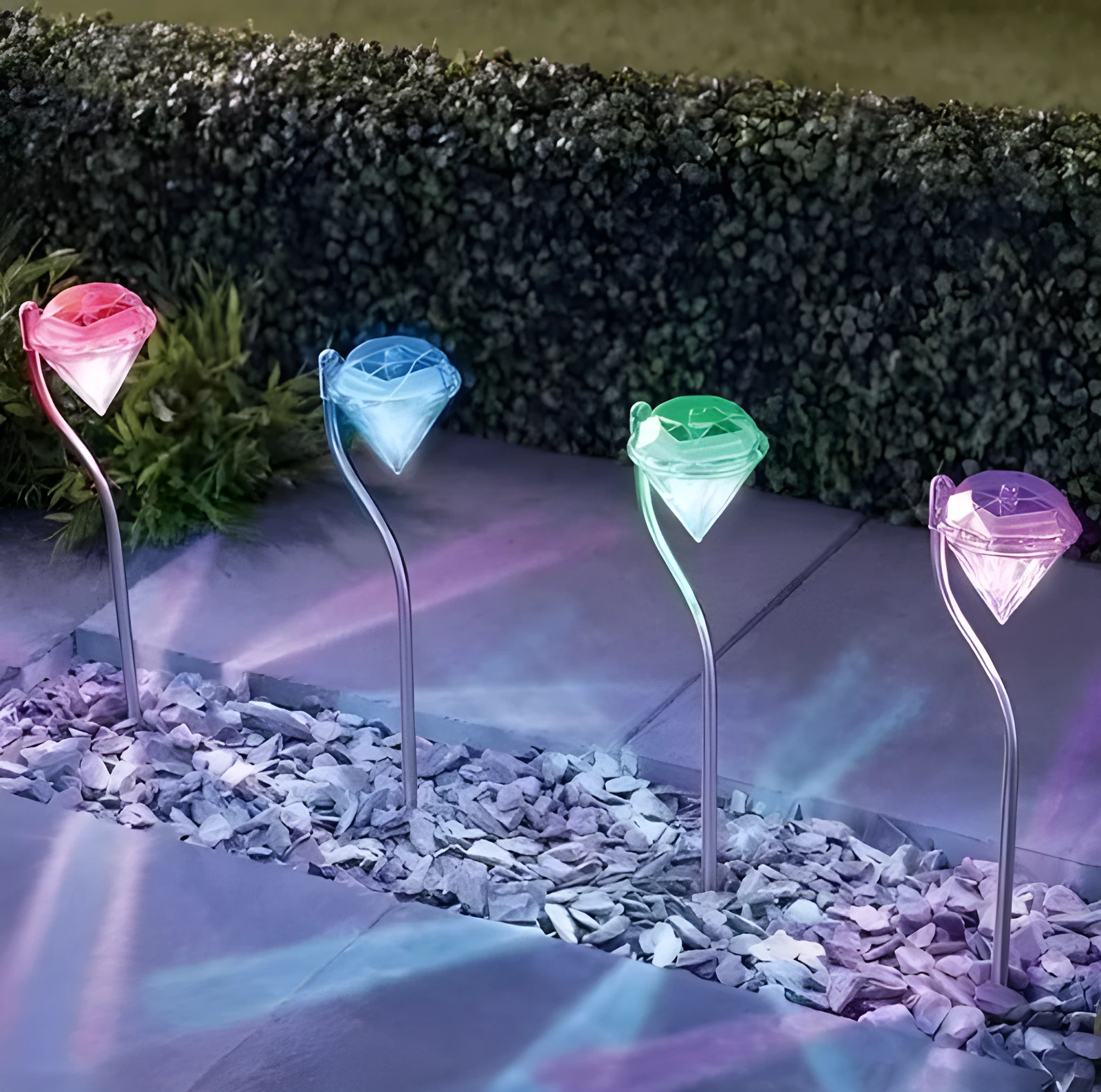 White solar-powered garden spotlight with adjustable lighting angle on a fence post.
