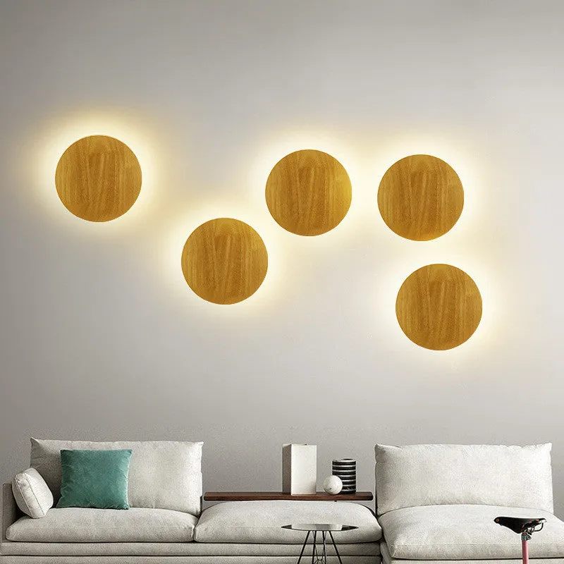 Log Art wood LED wall lamp with oval shape and warm light on a white wall