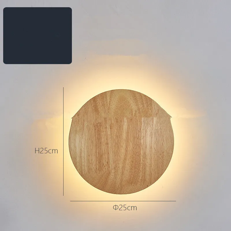Log Art wood LED wall lamp with oval shape and warm light on a white wall