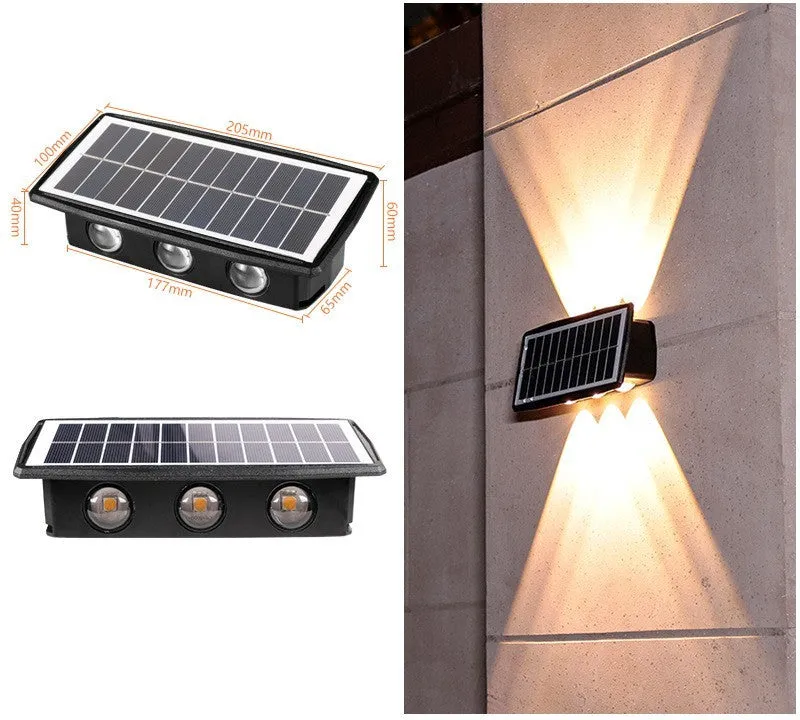 Solar outdoor wall light with 4 LED beads and glass polysilicon panel mounted on a garden wall