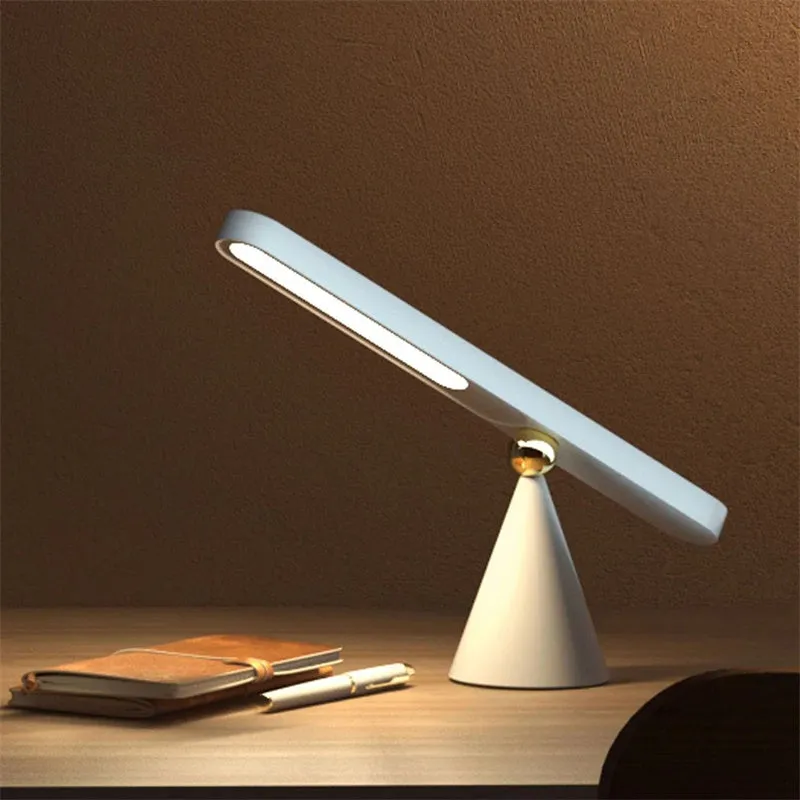 Creative geometric desk lamp in white with magnetic suction base and touch switch, USB powered