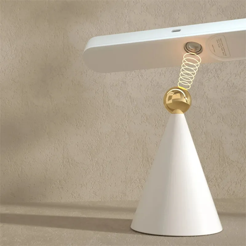 Creative geometric desk lamp in white with magnetic suction base and touch switch, USB powered