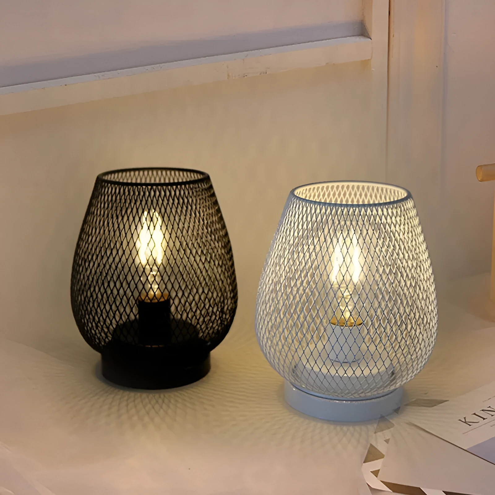 Retro iron art battery powered birdcage table lamp with warm light on bedside table