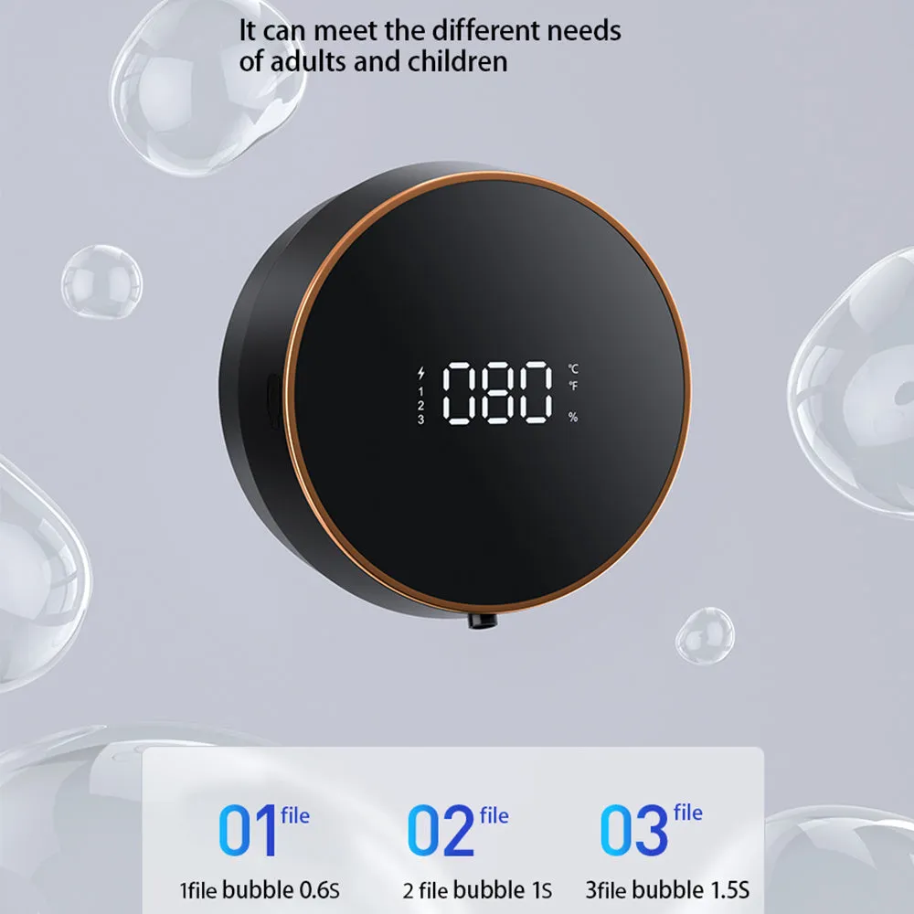 Black automatic sensor foam soap dispenser with USB port mounted on a white bathroom wall.