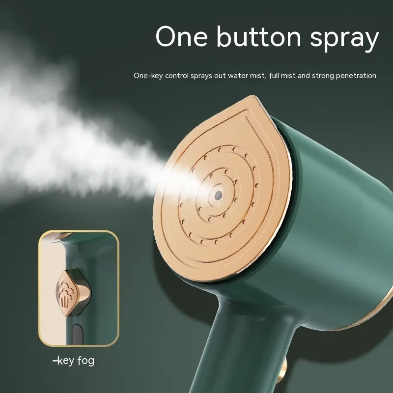 Mini handheld garment steamer in green with visual water tank and US plug