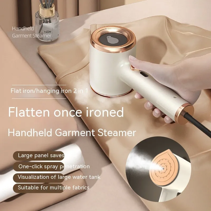Mini handheld garment steamer in green with visual water tank and US plug