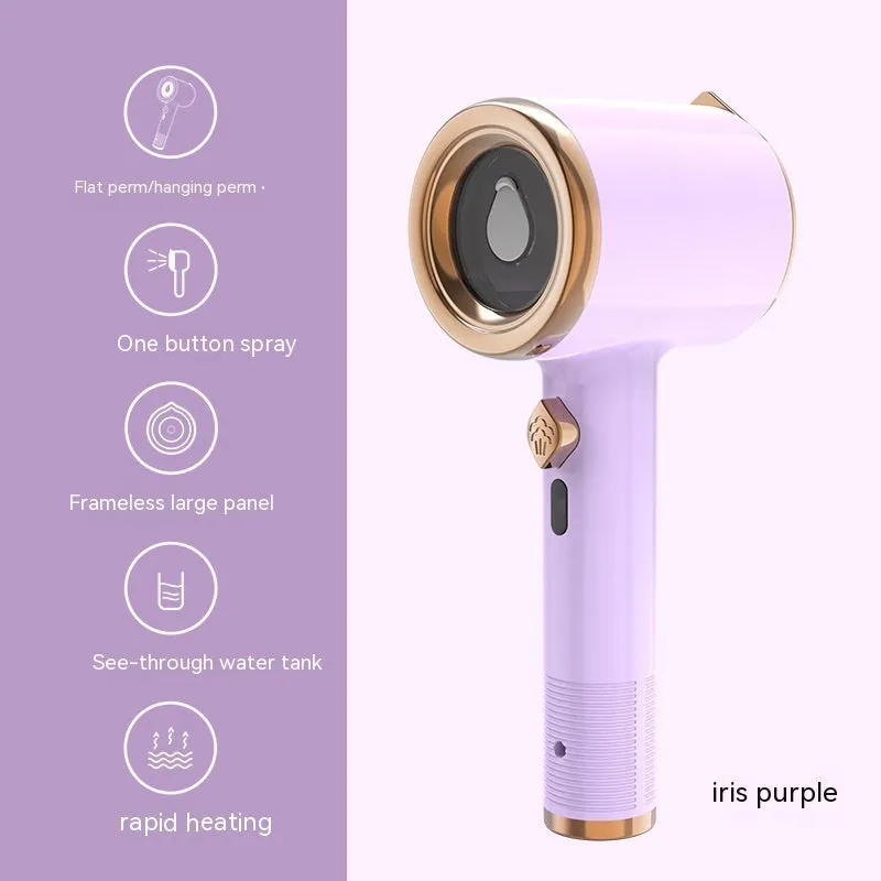 Mini handheld garment steamer in green with visual water tank and US plug