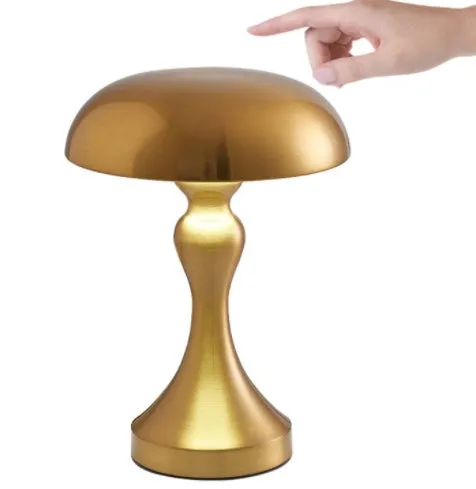 Bronze metallic touch-control LED desk lamp showing three light colour settings on a desk
