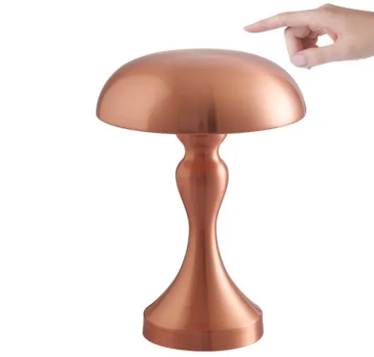 Bronze metallic touch-control LED desk lamp showing three light colour settings on a desk