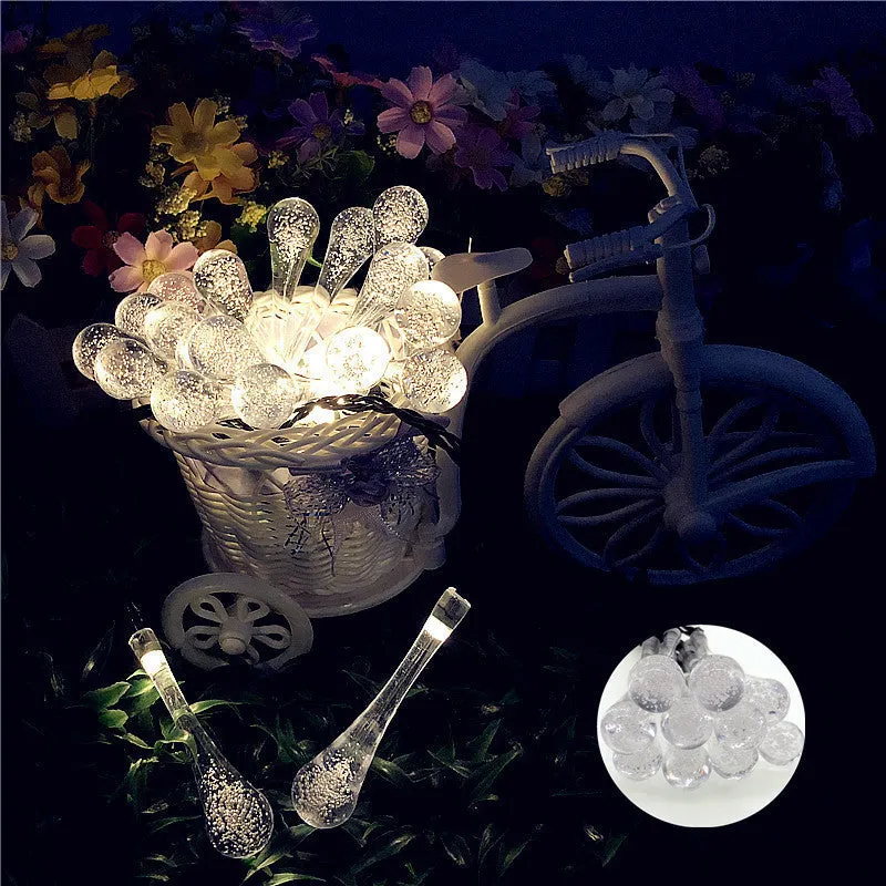 Solar-powered outdoor LED string lights with water drop pendants on 6.5m cable