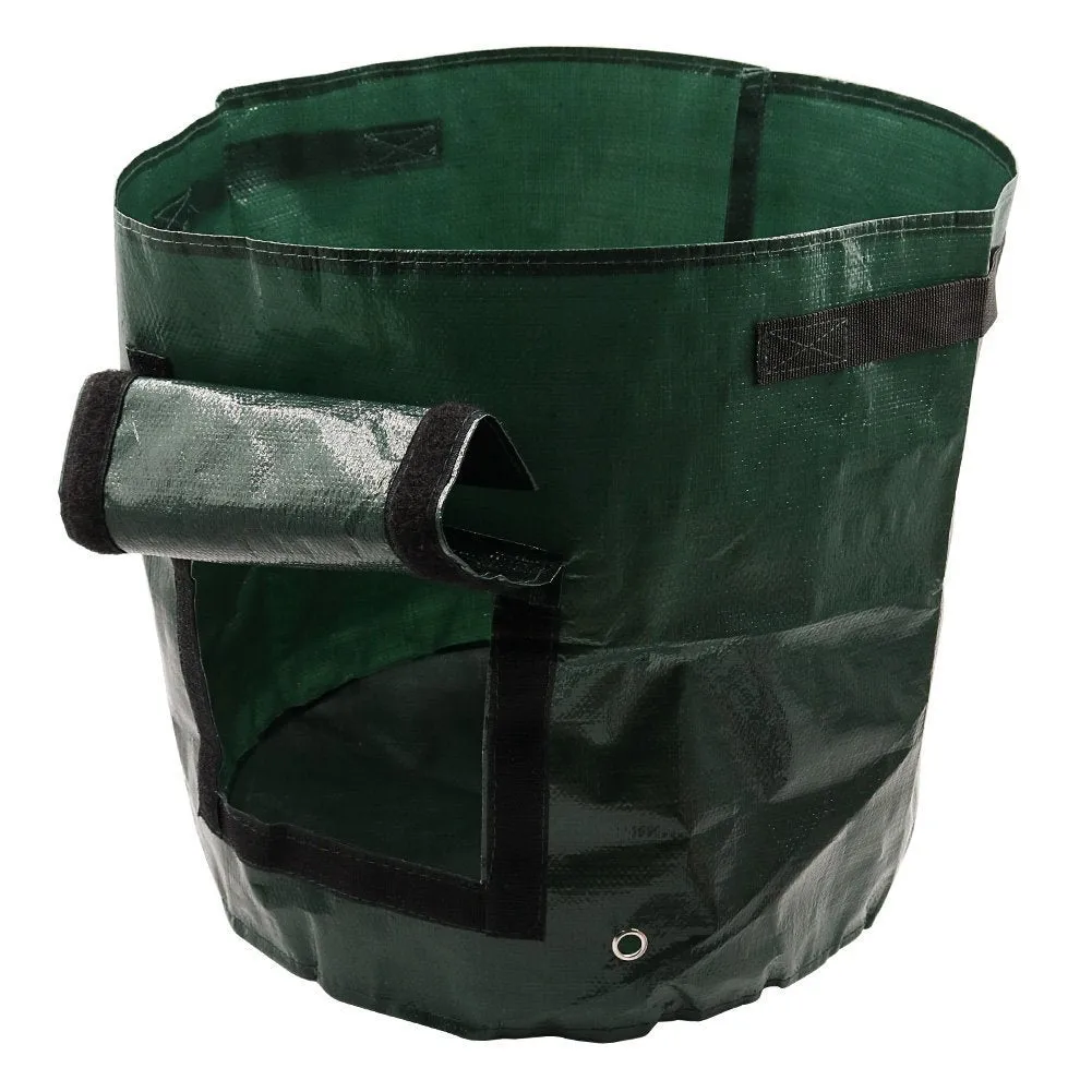 Dark green PE garden planting bag with side windows and double handles on a balcony