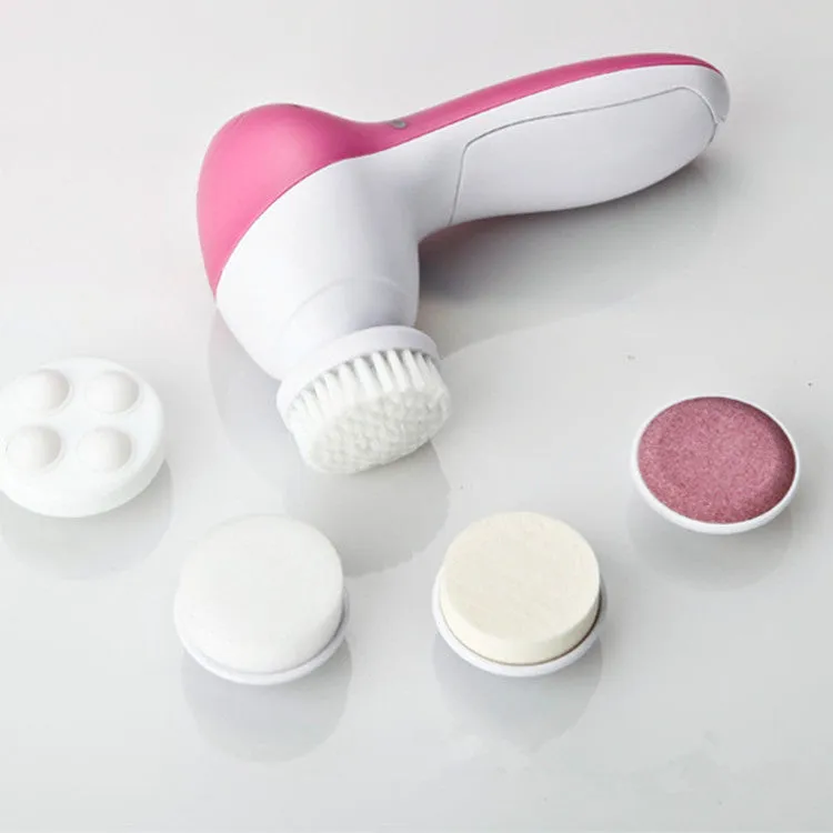 Pink electric facial cleanser with soft brush attachment and roller massager on white background, compact size