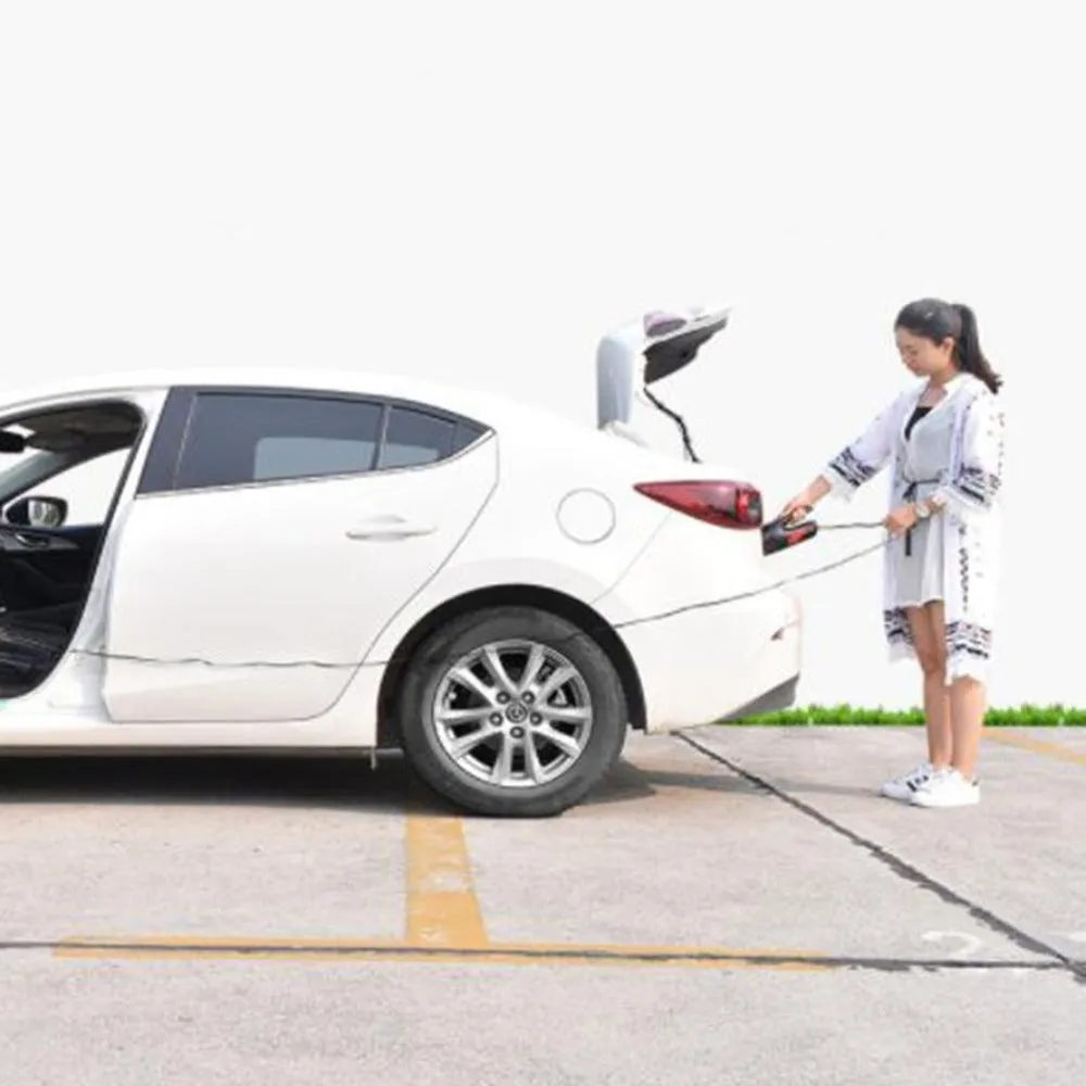 Black handheld 120W wet dry car vacuum cleaner with long nozzle and brush on car seat