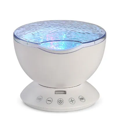 White and blue ocean wave projector LED night light with remote control, measuring 13x12x12 cm