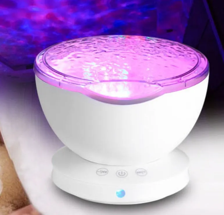 White and blue ocean wave projector LED night light with remote control, measuring 13x12x12 cm
