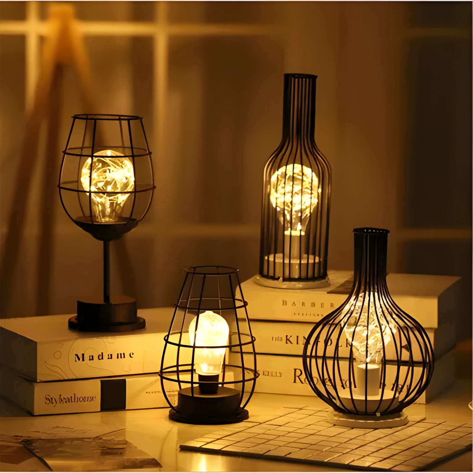 Hollow wrought iron wine bottle shaped table lamp with warm white LED light on a wooden desk
