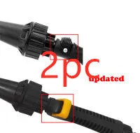 Water-driven rotary cleaning brush in black and yellow plastic connected to a garden hose for car wheel cleaning