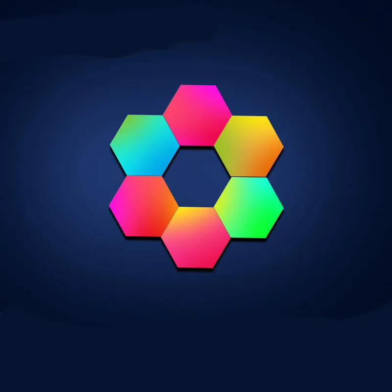 Colourful hexagonal LED wall lamp with remote control displaying rainbow effect on a bedroom wall