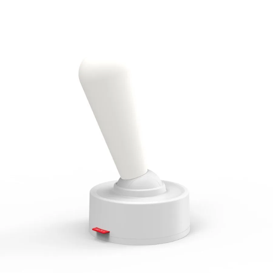 Toggle silicone USB rechargeable night light with warm LED, wall mounted in bedroom