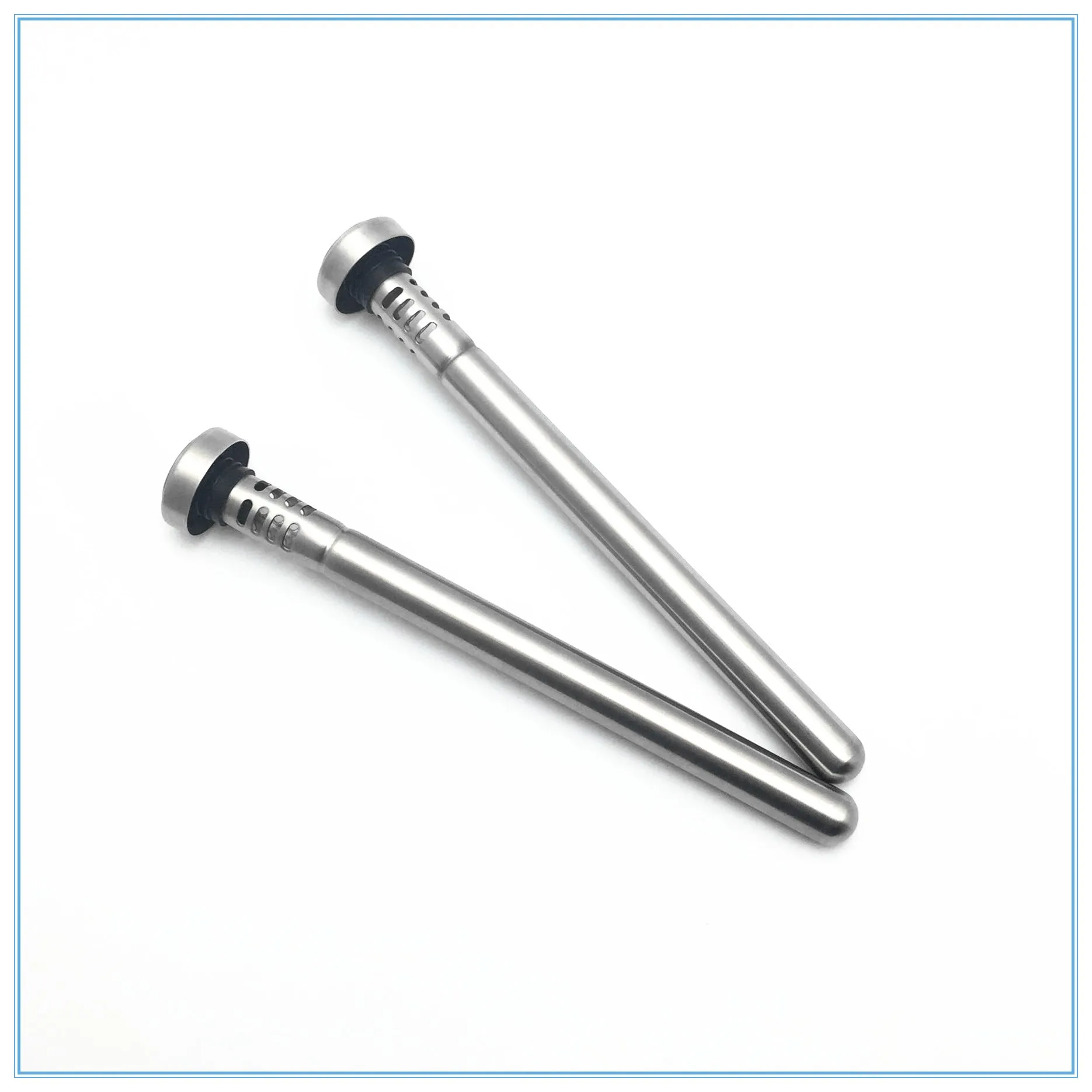 Stainless steel wine cooling rod and pourer in silver, with a bottle of red wine