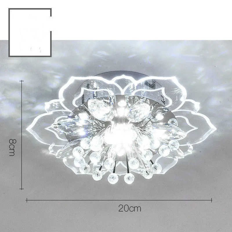 Modern crystal ceiling lamp with flower-shaped shade and LED light in warm white, white, or colour options.