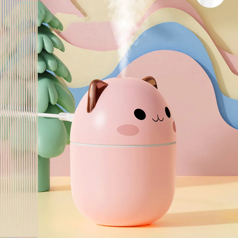 Cute cat-shaped USB air humidifier with LED cool mist spray in white, for office and bedroom use.