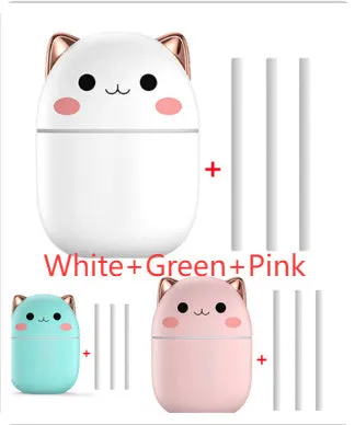 Cute cat-shaped USB air humidifier with LED cool mist spray in white, for office and bedroom use.